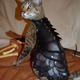 Illustration for article titled No Cat Is Complete Without A Set Of Leather Battle Armor